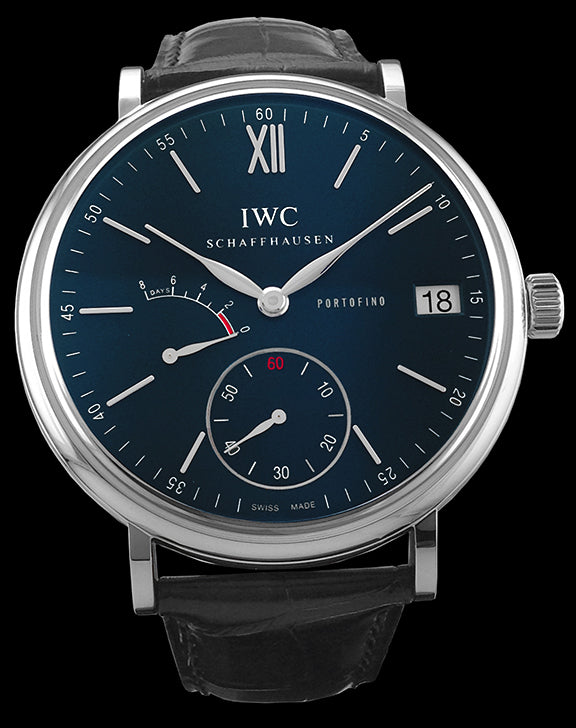 This watch has a stainless steel case with an arched-edge sapphire crystal over the blue dial. The hands and indexes are rhodium-plated and the date can be viewed at the 3 o’clock position. There is a  small seconds subdial at the 6 o’clock position and an 8 day power reserve at indicator at the 9 o’clock position. This watch features the IWC manufactured 59210 calibre manual wind movement with an 8 day power reserve.